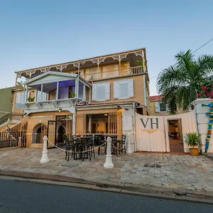 https://victoria-house.comcaribbean.com